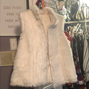 White fur vest
